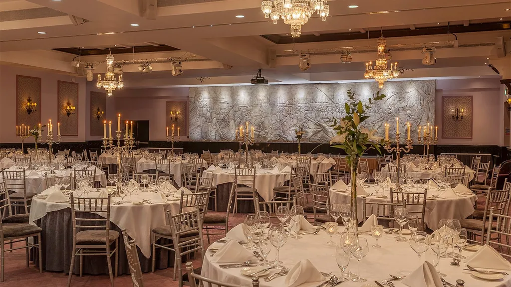 Ballroom set with round tables for a wedding banquet